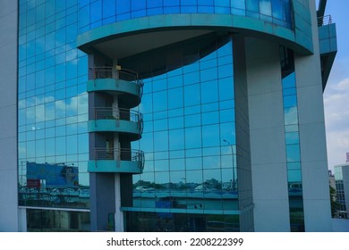 Kolkata, West Bengal, India - 20th July 2019 : Modern Architecture Of Buildings, Glass Exterior Reflecting Blue Sky, White Clouds And Othe Buildings.