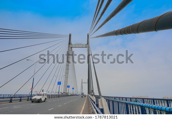 Kolkata, West Bengal, India - 21st June 2020\
: Cables of 2nd Hoogly Bridge, Kolkata, West Bengal, India. Blue\
sky in the background.