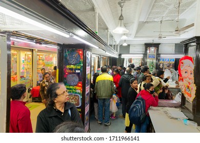 Kolkata, West Bengal, India - 29th December 2019 : Nahoum And Sons, New Market Area Is A Very Famous And Old Cake Shop. Customers Are Busy Buying Cakes Over The Sales Counter Inside The Shop.