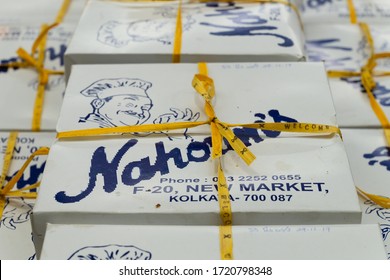 Kolkata, West Bengal, India - 29th December 2019 : Nahoum And Sons, New Market Area Is A Very Famous And Old Cake Shop. Sales People Are Busy Selling Cakes Over The Sales Counter Inside The Shop.