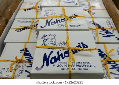 Kolkata, West Bengal, India - 29th December 2019 : Nahoum And Sons, New Market Area Is A Very Famous And Old Cake Shop. Sales People Are Busy Selling Cakes Over The Sales Counter Inside The Shop.