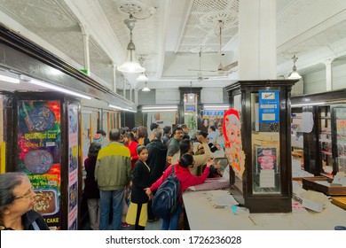 Kolkata, West Bengal, India - 29th December 2019 : Nahoum And Sons, New Market Area Is A Very Famous And Old Cake Shop. Customers Are Busy Buying Cakes Over The Sales Counter Inside The Shop.