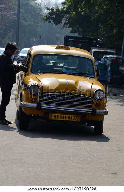 Kolkata, West Bengal, India - February 2020:\
Yellow Ambassador Taxi in\
Kolkata