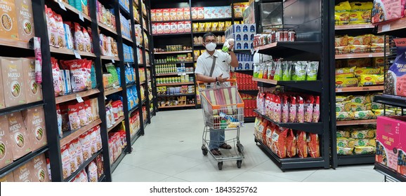 Kolkata, West Bengal / India - Oct 29 2020: A Man Shopping At The Spencer's Retail Store Wearing Mask And Maintaining Social Distancing As Per The Covid Precautions.. 