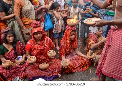 kolkata west bengal india on may 10th 2014 :Hindu devotees worship Sitala at Kolkata in the last day of Bengali calendar. Devotees perform various rituals during this event for well being their family