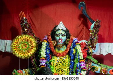 Kolkata,India - October 19, 2017 : Indian Hindu Goddess Kali is being worshipped inside decorated pandal, a temporary temple,at night. Kali Puja or Shyama Puja or Mahanisha Puja, is a Indian festival.