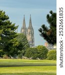 Koln, Germany - July 31, 2024: The Cologne Cathedral as seen from Rheinpark in Cologne, Germany
