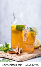 Kombucha Cocktail  And Mint Flavor, Glass Jar With Fermenting  Light Background 