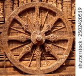 The Konark Sun Temple features a massive stone wheels. This wheel, one of the temple’s four giant wheels, serves as a sundial, accurately indicating the time of day based on the sunlight and shadows.