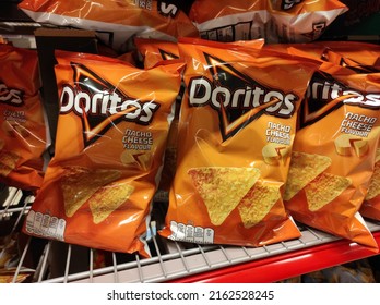 Kongsvinger, Norway 31 May 2022: Doritos Nacho Cheese Flavour Packages In A Row In The Shelf At The Grocery Store Import Savory Snacks Food