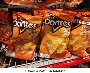 Kongsvinger, Norway 31 May 2022: Doritos Nacho Cheese Flavour Packages In A Row In The Shelf At The Grocery Store Import Savory Snacks Food