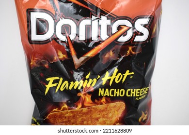 Kongsvinger, Norway 9 October 2022: Doritos Flaming Hot Nacho Cheese Tortilla Chips Flavor Package Savory Crisps Snacks Food Isolated On White Background