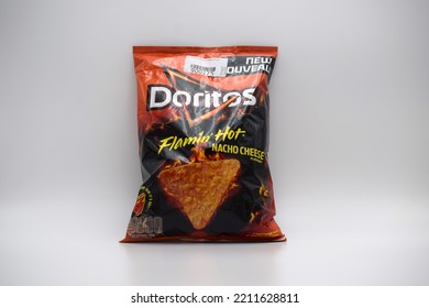 Kongsvinger, Norway 9 October 2022: Doritos Flaming Hot Nacho Cheese Tortilla Chips Flavor Package Savory Crisps Snacks Food Isolated On White Background