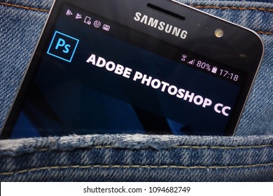KONSKIE, POLAND - MAY 17, 2018: Adobe Photoshop website displayed on Samsung smartphone hidden in jeans pocket