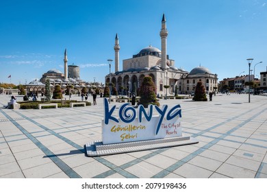 Konya, Turkey - September 2021: Konya old town's central square with the Mevlana Museum and Selimiye Mosque. Konya is a pilgrimage destination for Sufis, focused on the tomb of the Mevlana order, Rumi