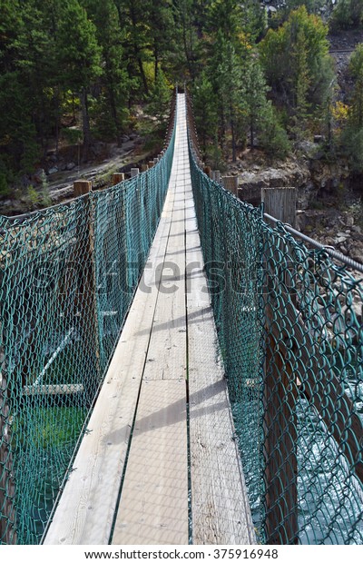 Kootenai River Swinging Bridge Between Troy Stock Photo