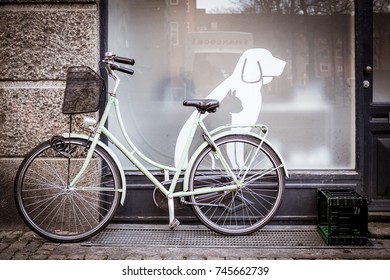 Kopenhagen, December 28 2014: Bicycle In Front Of A Pet Store In Kopenhagen.