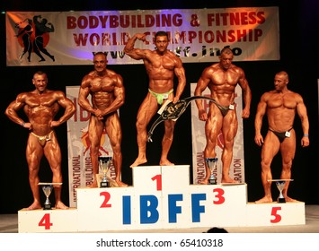 KOPER-NOVEMBER 13:1st Mauro Zotti 2nd Eric Orao 3rd Jovce Vasilevski 4th Gennaro Iscaro 5th Zoltan Vasarhery In IBFF Bodybuilding World Championship Masters Category November 13, 2010  Koper, Slovenia