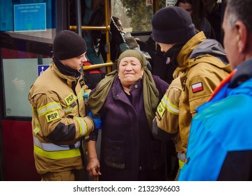Korczowa, Poland 5.03.2022 -  Polish firefighters help refugees from Ukraine at the border crossing in Korczowa                           