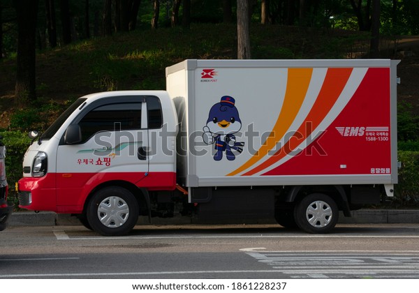 A Korea post delivery truck\
is parked on the streets of Seoul. (Seoul, Korea. May 25,\
2020)