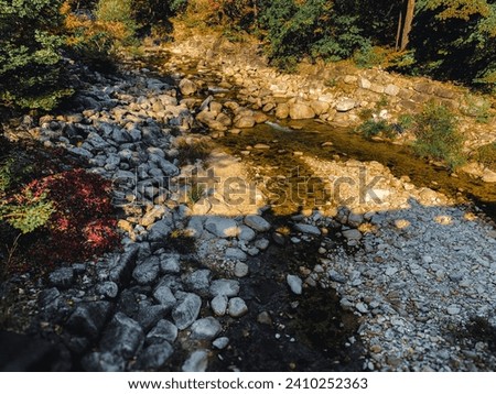 Korea River Bank with Rocks Water Streaming Background
