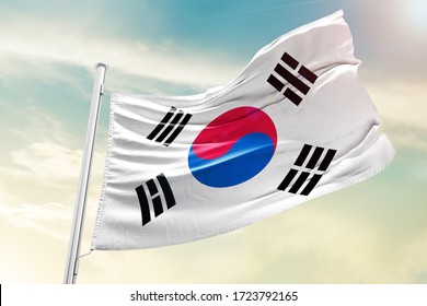 Korea south national flag cloth fabric waving on the sky with beautiful sky - Image