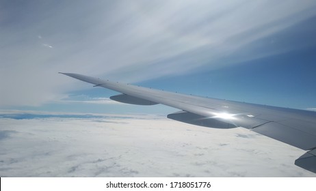 Korean Air Flight Wings And Clouds