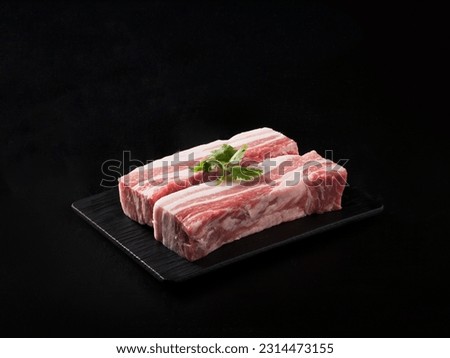 Korean bbq, raw pork and beef dish on the table