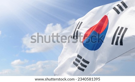 Korean flag waving in the sky. National Liberation Day of Korea concept