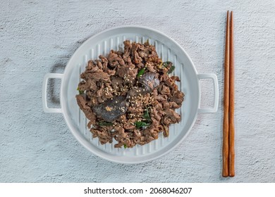 Korean food beef bulgogi dish on plate - Shutterstock ID 2068046207