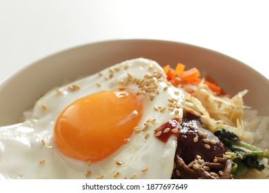 Korean food, mixed vegetable and sunny side up egg rice Bibimbap