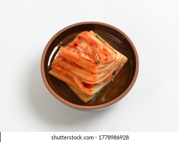 Korean Food Mugeunji(ripened Cabbage Kimchi) On A Small Dish With White Background, South Korea
