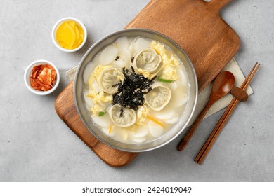 Korean food, snack, gimbap, bulgogi, rice bowl, bibimbap, stir-fried spicy pork, cheese, flying fish roe, rice cake, dumpling soup, tteokbokki, sundae, and Rabokki, food, dish, meal, dinner, rice, - Powered by Shutterstock