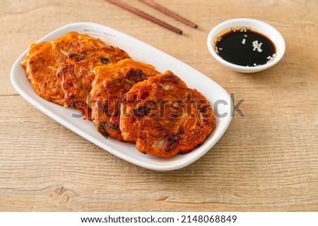 Korean Kimchi pancake or Kimchijeon - Fried Mixed Egg, Kimchi, and Flour - Korean traditional food style