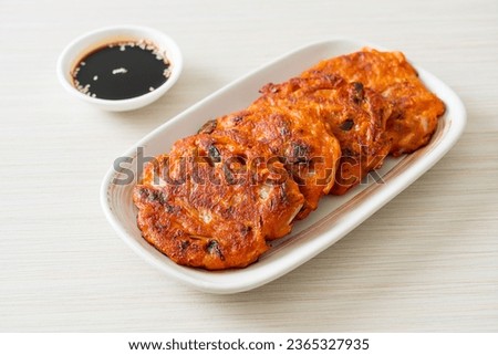 Korean Kimchi pancake or Kimchijeon - Fried Mixed Egg, Kimchi, and Flour - Korean traditional food style