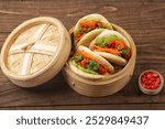 Korean Pao.Bao buns with chicken crispy and vegetable. Asian cuisine