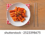 Korean rice cake stick with sausage in spicy sauce (Tteokbokki) - Korean food style