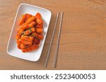 Korean rice cake stick with sausage in spicy sauce (Tteokbokki) - Korean food style