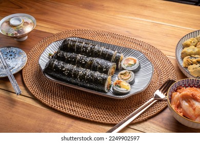 Korean Seaweed Rice Rolls or Kimbap Korean dish made from cooked rice  vegetables, meats that are rolled in seaweed, Bulgogi Kimbap and pork bbq Kimbap Korean food.