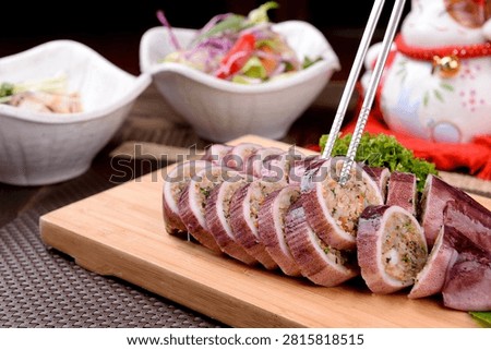 Korean squid sundae (Ojingeo Sundae) stuffed with seasoned squid and vegetables, a popular street food.