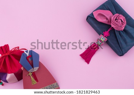 Korean traditional clothes and korean traditional gift background.