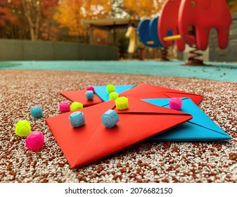 Korean traditional outdoor game tools on the playground. Gonggi and Ttakji. 
