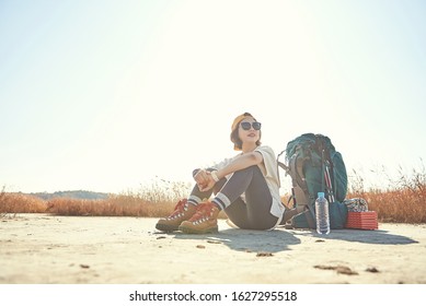 Korean woman is backpacking on an island in Korea. - Shutterstock ID 1627295518