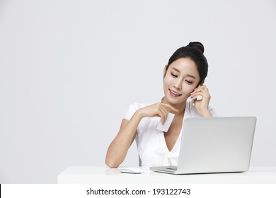 Korean Woman Browsing And Shopping Online