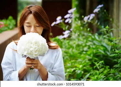 Korean Woman Holding Flower Bouquet 