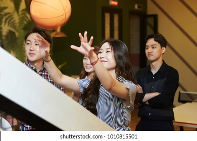 Korean Women And Men Playing Basketball Arcade Game 