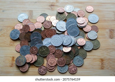 Korean won coins on wooden background,  South Korean collectible coin,  empire, collectors, numismatic, metal money 