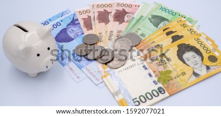Korean won notes and Korean won coins for money concept background      