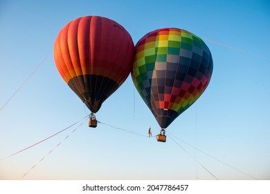 Korotych Airfield, Kharkiv, Ukraine – August 28, 2021: Two Hot Air Balloons And Aerial Performer During KharkivAviaFest-2021 Airshow