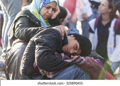 Kos, Greece - October 10, 2015: Syrian Refugee And Her Child At A Volunteer's Camp